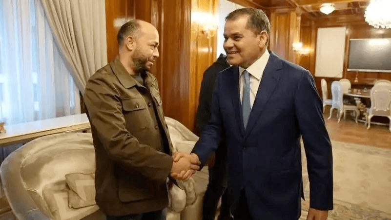 لقاء الدبيبة بزعيم تهريب مطلوب دوليًا يفجّر غضبًا في ليبيا